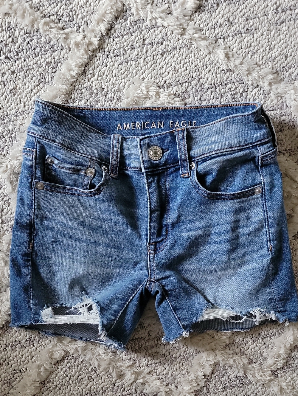 American Eagle Distressed Mid-Blue Denim Distressed Midi Shorts